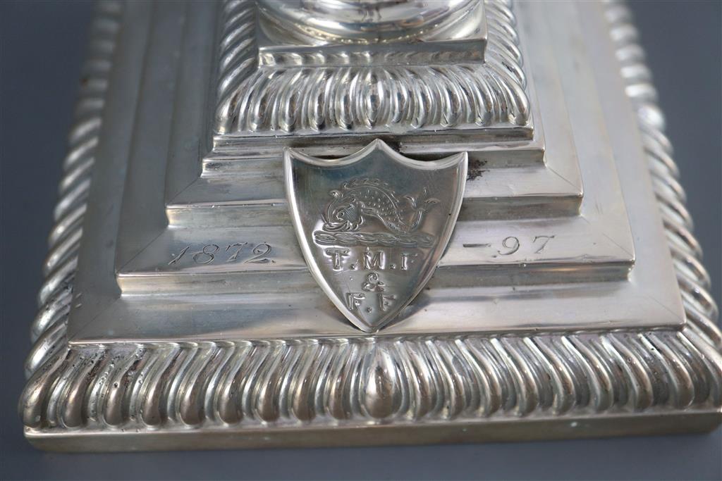 A pair of late Victorian silver corinthian column four branch, five light candelabra by Carrington & Co,
